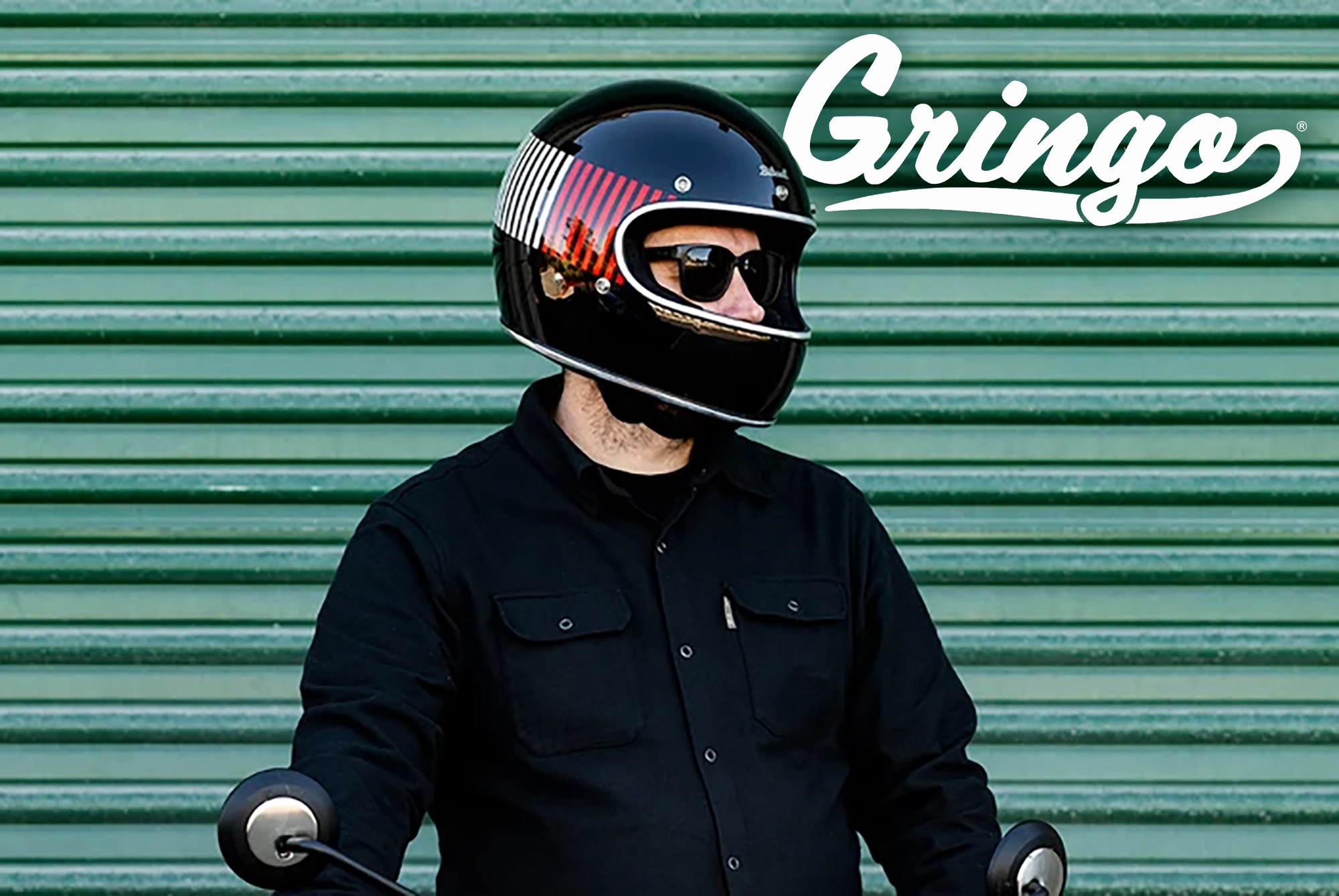 Man wearing the Black White Red & Blue Gringo Helmet