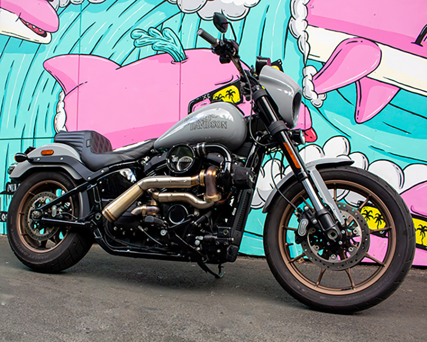 Three quarter view of the turbocharged 2024 Low Rider S against a painted mural