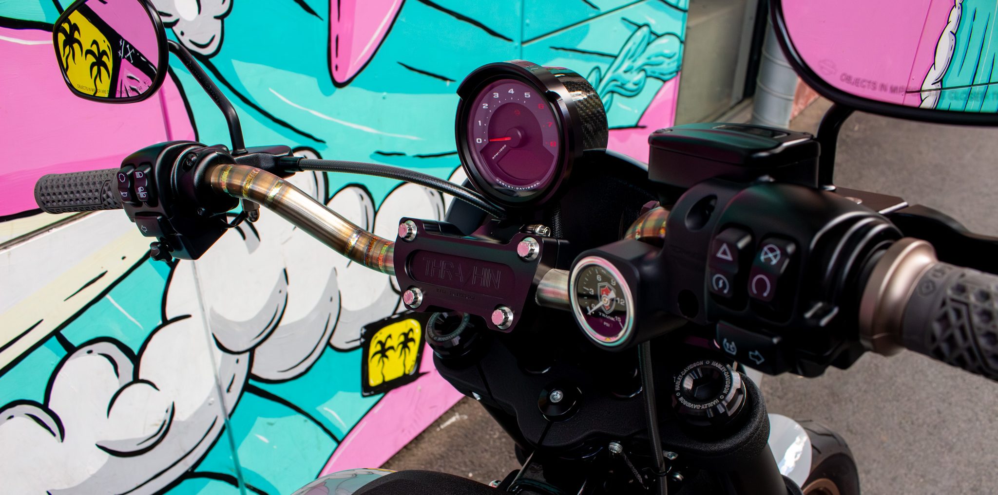 Cockpit of the 2024 Low Rider S showing the relocated gauge, Arlen Ness MX handlebar and standard controls
